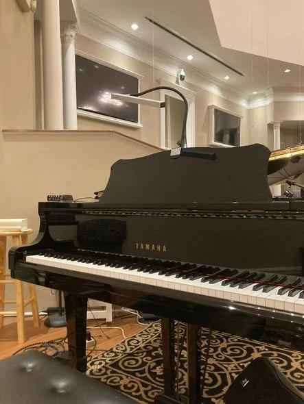 Yamaha grand piano in performance space — Moore Piano Services