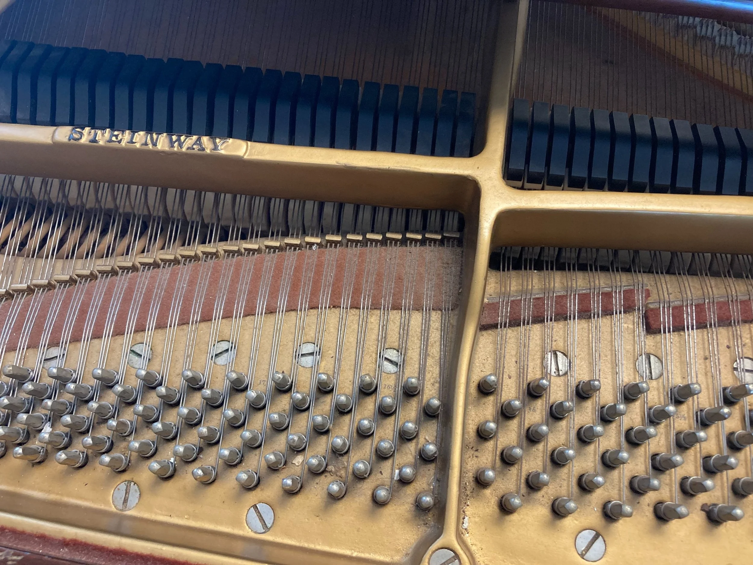Golden piano strings and internal harp